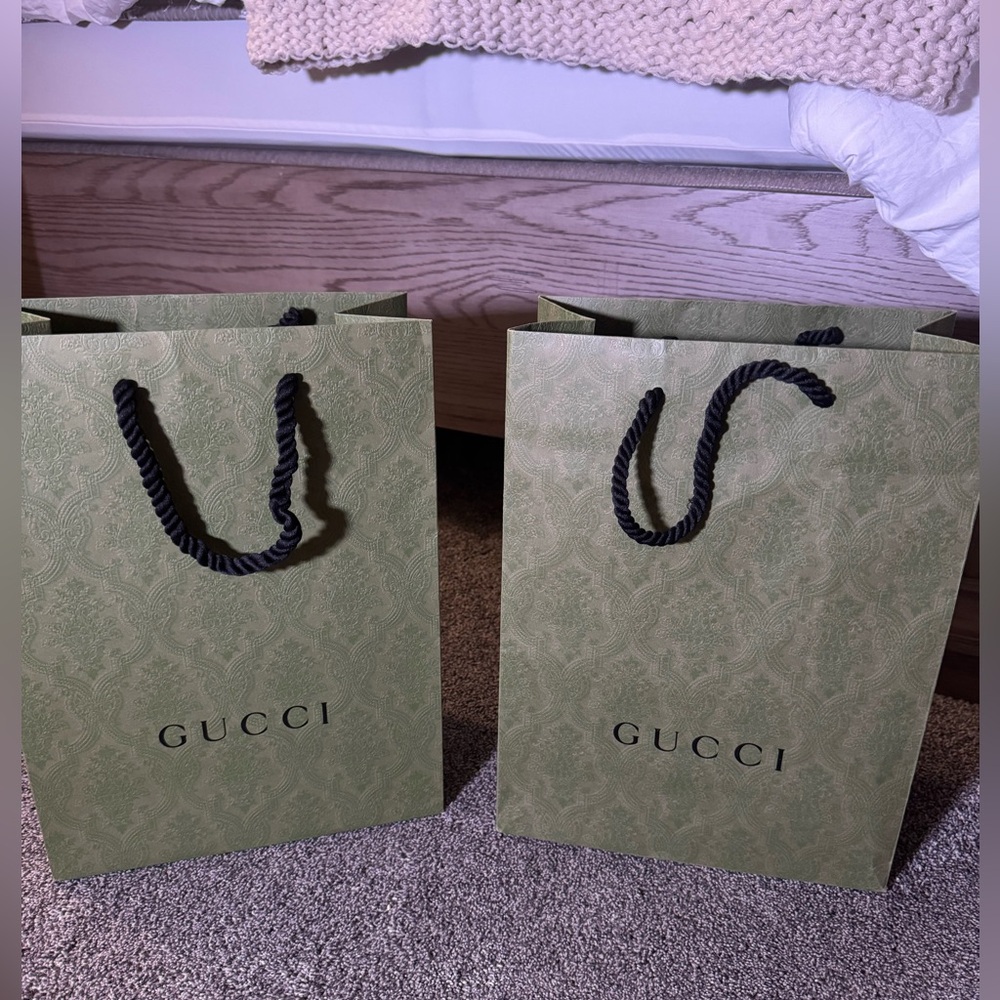 Two Empty Gucci Green Bags